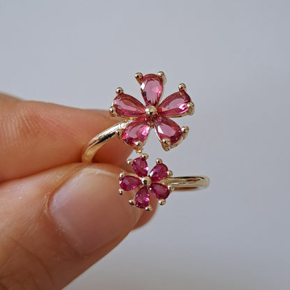 Gold plated brass open ring embedded with pink zircons/flower design