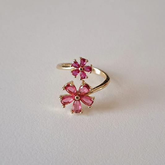 Gold plated brass open ring embedded with pink zircons/flower design