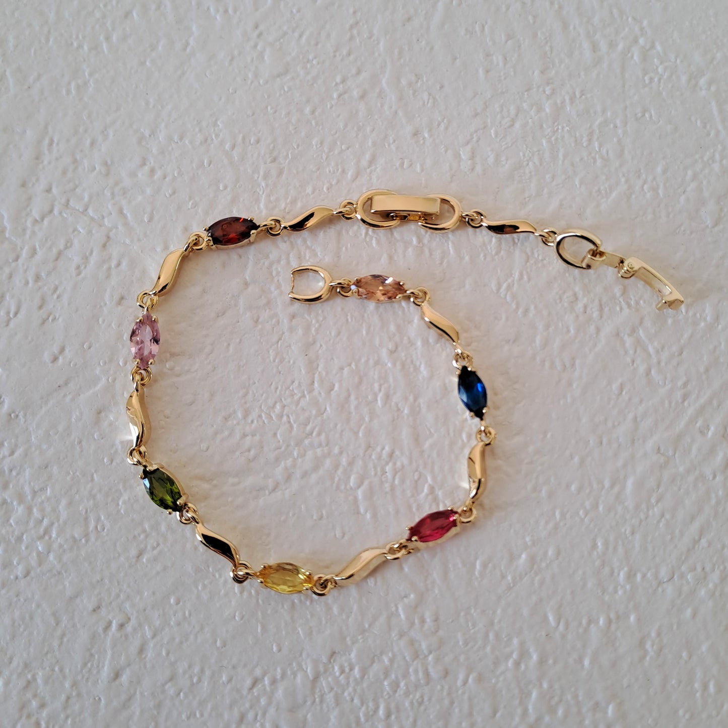 Elegant Gold-plated brass bracelet embedded with colorful zircons