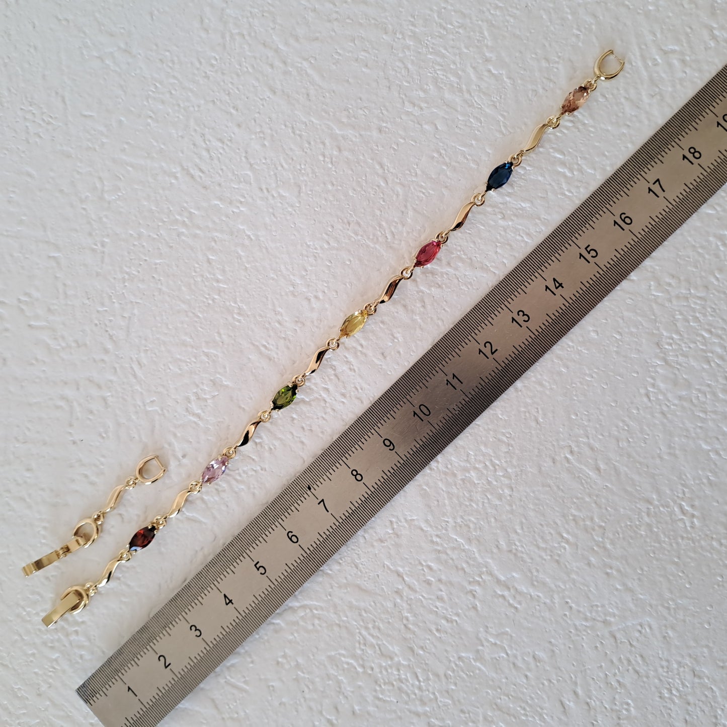 Elegant Gold-plated brass bracelet embedded with colorful zircons