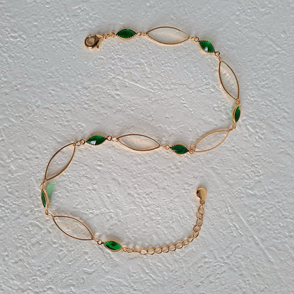 Vintage gold-plated copper anklet with green glass stones