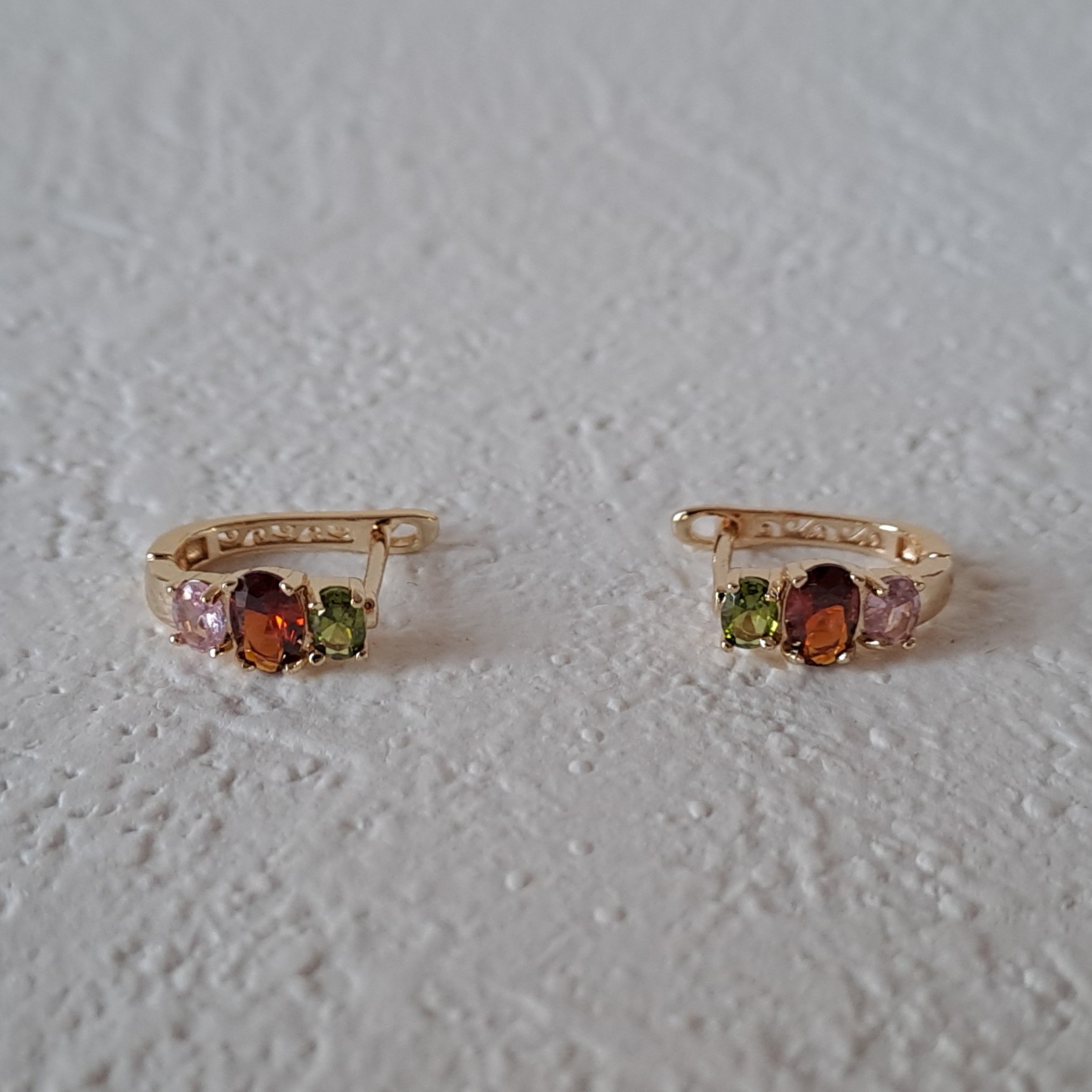 shiny gold plated copper hoop earrings with colorful zircon inlay shiny gold plated copper hoop earrings with colorful zircon inlay